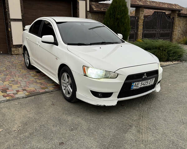 Білий Міцубісі Lancer, об'ємом двигуна 2 л та пробігом 269 тис. км за 6000 $, фото 10 на Automoto.ua