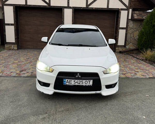 Білий Міцубісі Lancer, об'ємом двигуна 2 л та пробігом 269 тис. км за 6000 $, фото 2 на Automoto.ua