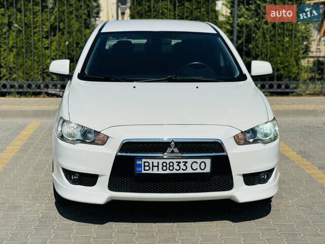 Білий Міцубісі Lancer, об'ємом двигуна 2 л та пробігом 163 тис. км за 6500 $, фото 9 на Automoto.ua