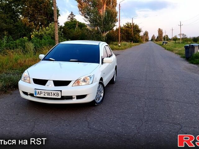 Білий Міцубісі Lancer, об'ємом двигуна 1.6 л та пробігом 237 тис. км за 6000 $, фото 1 на Automoto.ua