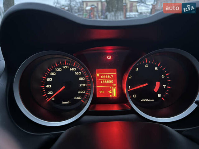 Белый Мицубиси Лансер, объемом двигателя 2 л и пробегом 185 тыс. км за 7600 $, фото 13 на Automoto.ua