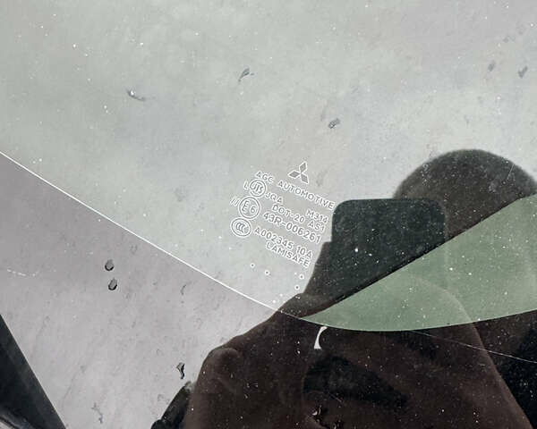 Білий Міцубісі Lancer, об'ємом двигуна 2 л та пробігом 269 тис. км за 6000 $, фото 18 на Automoto.ua