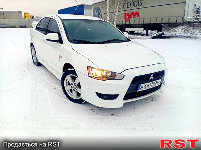 Білий Міцубісі Lancer, об'ємом двигуна 2 л та пробігом 210 тис. км за 7500 $, фото 1 на Automoto.ua