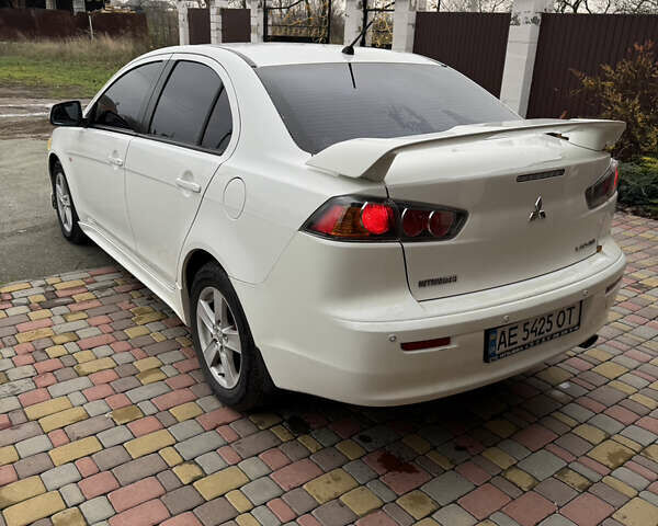 Білий Міцубісі Lancer, об'ємом двигуна 2 л та пробігом 269 тис. км за 6000 $, фото 4 на Automoto.ua