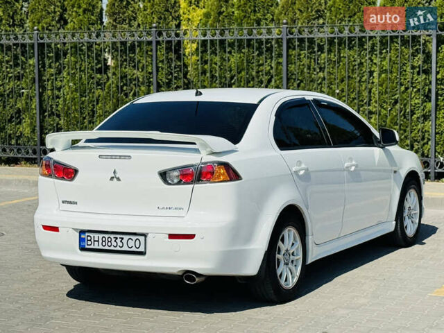 Білий Міцубісі Lancer, об'ємом двигуна 2 л та пробігом 163 тис. км за 6500 $, фото 15 на Automoto.ua