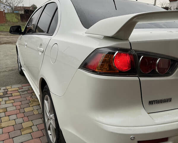 Білий Міцубісі Lancer, об'ємом двигуна 2 л та пробігом 269 тис. км за 6000 $, фото 5 на Automoto.ua