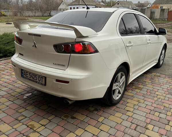 Білий Міцубісі Lancer, об'ємом двигуна 2 л та пробігом 269 тис. км за 6000 $, фото 8 на Automoto.ua