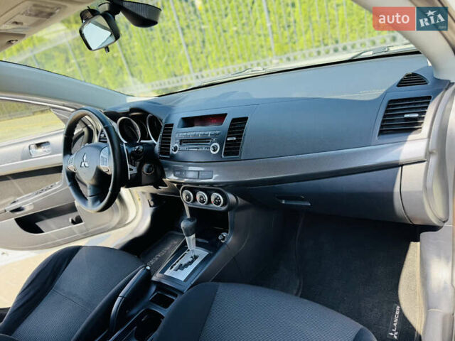 Білий Міцубісі Lancer, об'ємом двигуна 2 л та пробігом 163 тис. км за 6500 $, фото 21 на Automoto.ua