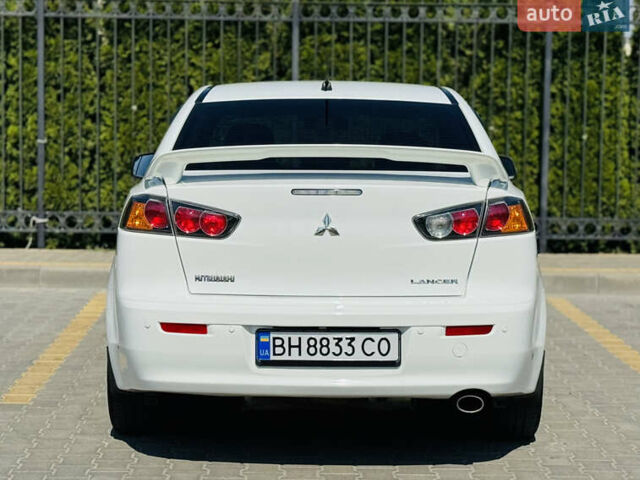 Білий Міцубісі Lancer, об'ємом двигуна 2 л та пробігом 163 тис. км за 6500 $, фото 17 на Automoto.ua