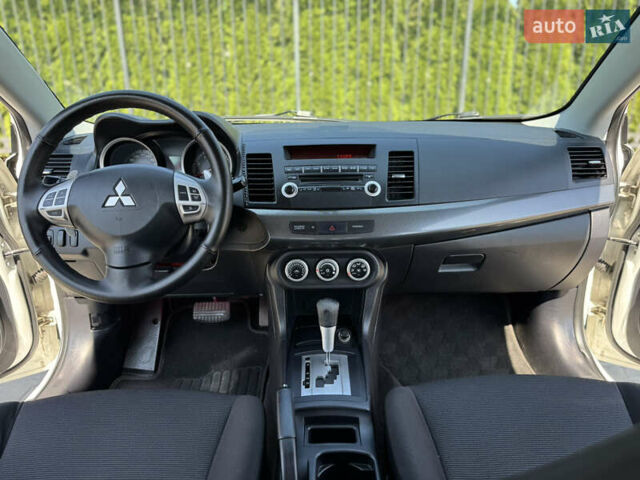 Білий Міцубісі Lancer, об'ємом двигуна 2 л та пробігом 163 тис. км за 6500 $, фото 29 на Automoto.ua