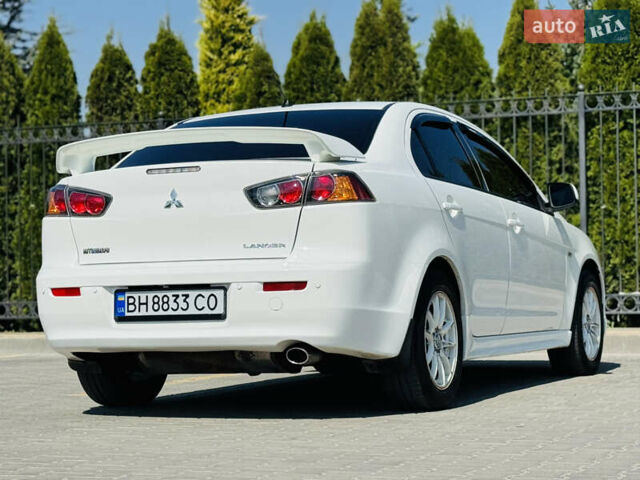 Білий Міцубісі Lancer, об'ємом двигуна 2 л та пробігом 163 тис. км за 6500 $, фото 16 на Automoto.ua