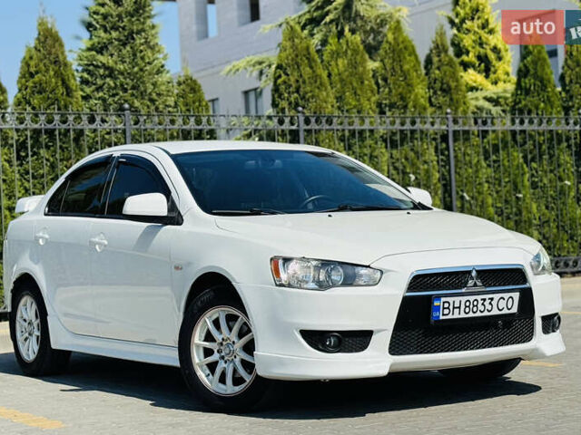 Білий Міцубісі Lancer, об'ємом двигуна 2 л та пробігом 163 тис. км за 6500 $, фото 5 на Automoto.ua