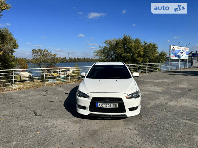 Білий Міцубісі Lancer, об'ємом двигуна 2 л та пробігом 198 тис. км за 10000 $, фото 1 на Automoto.ua