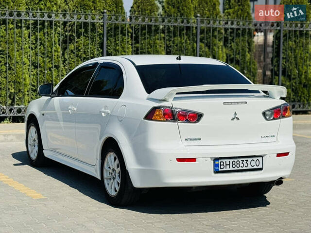Білий Міцубісі Lancer, об'ємом двигуна 2 л та пробігом 163 тис. км за 6500 $, фото 12 на Automoto.ua