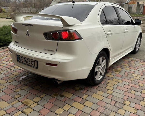 Білий Міцубісі Lancer, об'ємом двигуна 2 л та пробігом 269 тис. км за 6000 $, фото 9 на Automoto.ua
