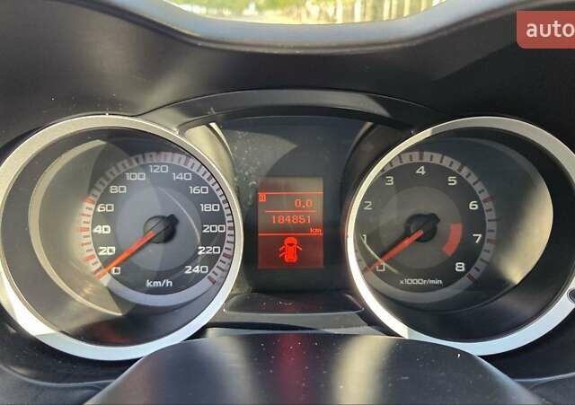 Белый Мицубиси Лансер, объемом двигателя 2 л и пробегом 185 тыс. км за 7600 $, фото 17 на Automoto.ua