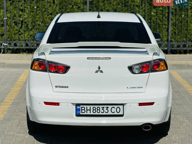Білий Міцубісі Lancer, об'ємом двигуна 2 л та пробігом 163 тис. км за 6500 $, фото 18 на Automoto.ua