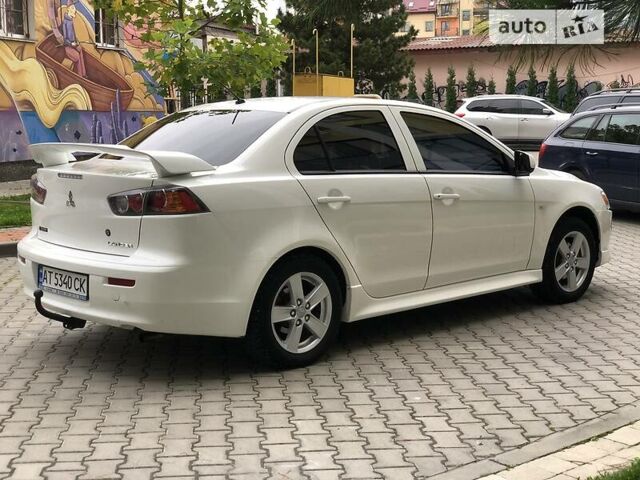 Білий Міцубісі Lancer, об'ємом двигуна 1.5 л та пробігом 140 тис. км за 7950 $, фото 23 на Automoto.ua