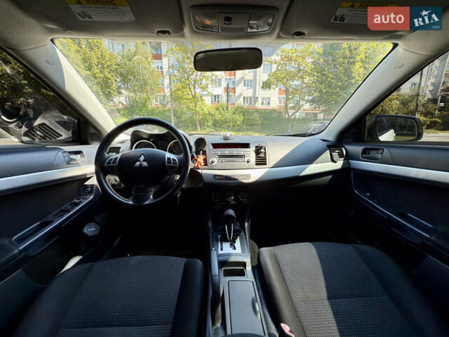 Білий Міцубісі Lancer, об'ємом двигуна 2 л та пробігом 240 тис. км за 7500 $, фото 9 на Automoto.ua