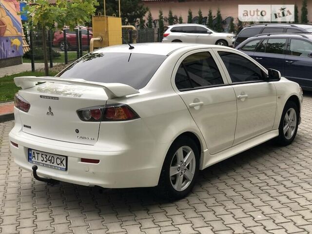 Білий Міцубісі Lancer, об'ємом двигуна 1.5 л та пробігом 140 тис. км за 7950 $, фото 22 на Automoto.ua