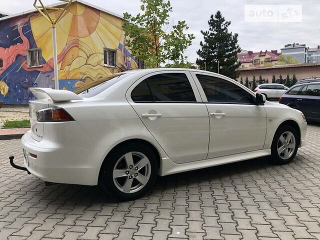 Білий Міцубісі Lancer, об'ємом двигуна 1.5 л та пробігом 140 тис. км за 7950 $, фото 24 на Automoto.ua