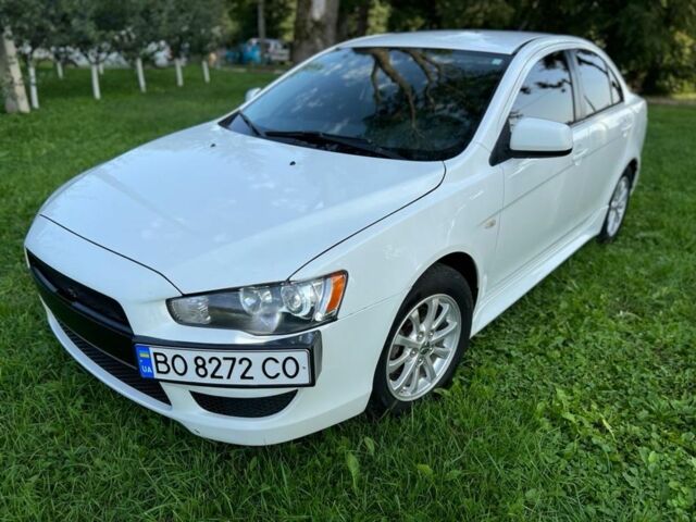 Білий Міцубісі Lancer, об'ємом двигуна 2 л та пробігом 165 тис. км за 9200 $, фото 20 на Automoto.ua