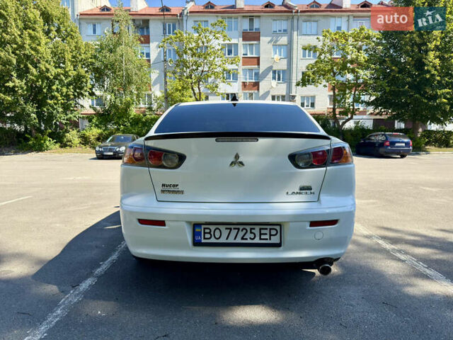 Білий Міцубісі Lancer, об'ємом двигуна 2 л та пробігом 240 тис. км за 7500 $, фото 4 на Automoto.ua