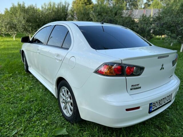 Білий Міцубісі Lancer, об'ємом двигуна 2 л та пробігом 165 тис. км за 9200 $, фото 9 на Automoto.ua