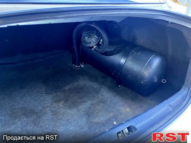 Білий Міцубісі Lancer, об'ємом двигуна 1.5 л та пробігом 218 тис. км за 6000 $, фото 4 на Automoto.ua
