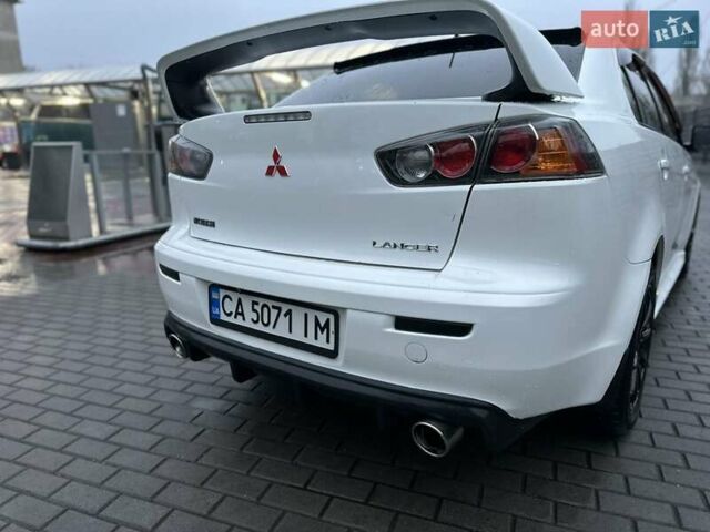 Білий Міцубісі Lancer, об'ємом двигуна 2 л та пробігом 225 тис. км за 7800 $, фото 7 на Automoto.ua