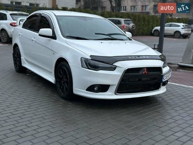 Білий Міцубісі Lancer, об'ємом двигуна 2 л та пробігом 225 тис. км за 7800 $, фото 2 на Automoto.ua
