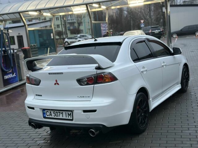 Белый Мицубиси Лансер, объемом двигателя 2 л и пробегом 225 тыс. км за 7800 $, фото 4 на Automoto.ua