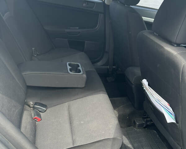 Білий Міцубісі Lancer, об'ємом двигуна 1.5 л та пробігом 190 тис. км за 5700 $, фото 15 на Automoto.ua