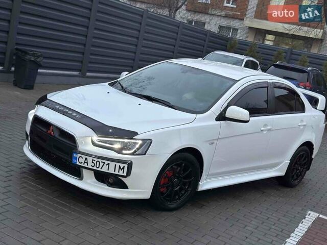 Білий Міцубісі Lancer, об'ємом двигуна 2 л та пробігом 225 тис. км за 7800 $, фото 8 на Automoto.ua