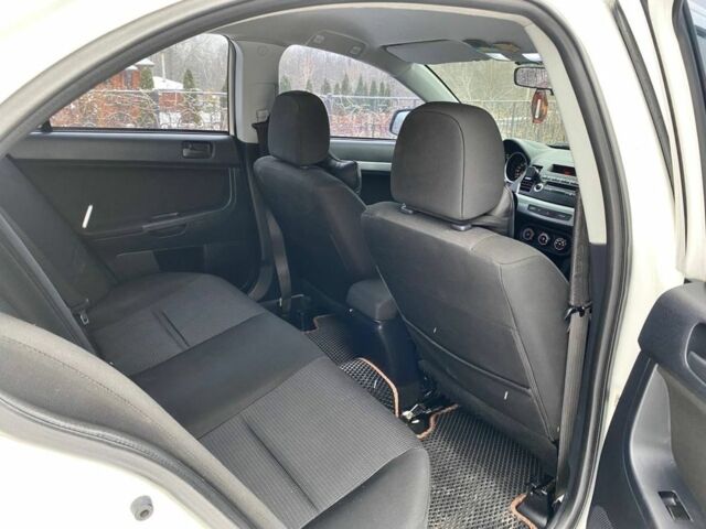 Білий Міцубісі Lancer, об'ємом двигуна 1.5 л та пробігом 198 тис. км за 5500 $, фото 10 на Automoto.ua