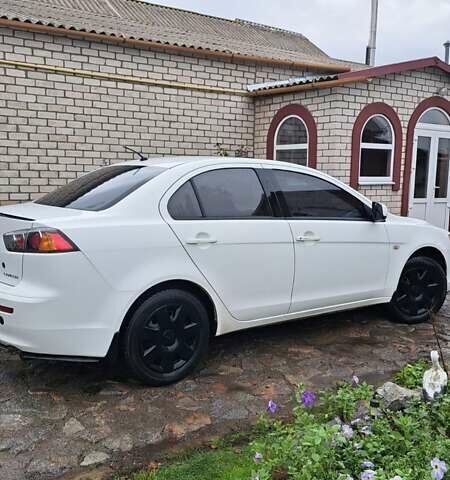 Белый Мицубиси Лансер, объемом двигателя 1.5 л и пробегом 160 тыс. км за 7600 $, фото 6 на Automoto.ua
