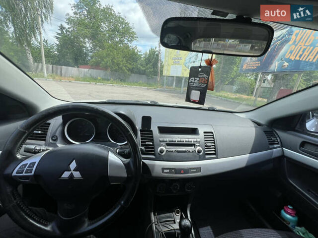 Білий Міцубісі Lancer, об'ємом двигуна 1.5 л та пробігом 190 тис. км за 5700 $, фото 19 на Automoto.ua