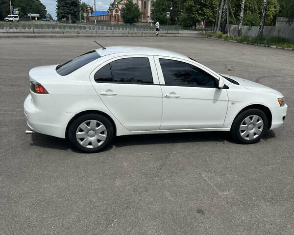 Білий Міцубісі Lancer, об'ємом двигуна 1.5 л та пробігом 190 тис. км за 5700 $, фото 2 на Automoto.ua
