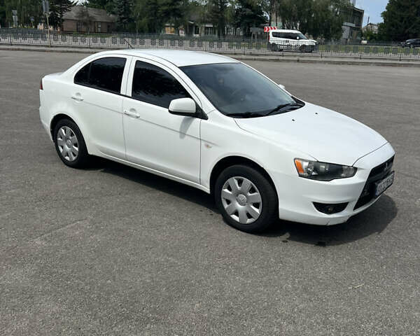 Білий Міцубісі Lancer, об'ємом двигуна 1.5 л та пробігом 190 тис. км за 5700 $, фото 1 на Automoto.ua