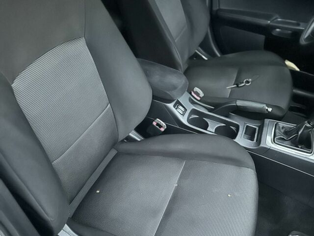 Белый Мицубиси Лансер, объемом двигателя 2 л и пробегом 225 тыс. км за 7800 $, фото 13 на Automoto.ua