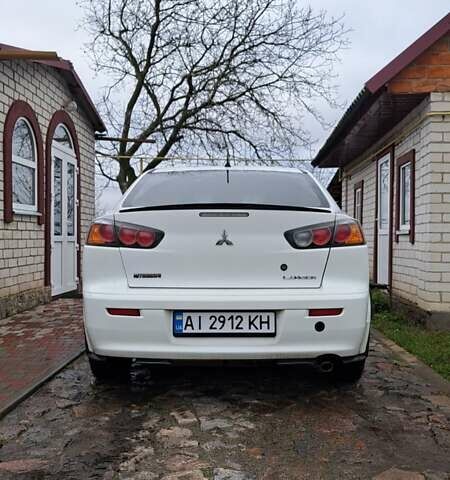 Белый Мицубиси Лансер, объемом двигателя 1.5 л и пробегом 160 тыс. км за 7600 $, фото 2 на Automoto.ua