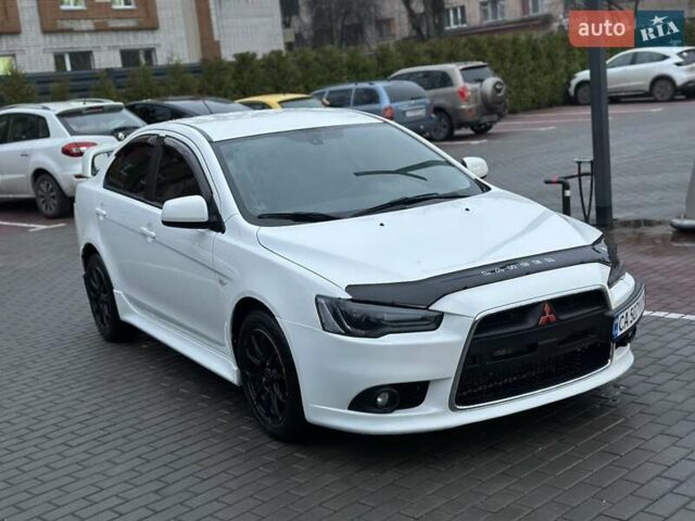 Білий Міцубісі Lancer, об'ємом двигуна 2 л та пробігом 225 тис. км за 7800 $, фото 1 на Automoto.ua
