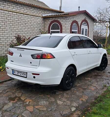 Белый Мицубиси Лансер, объемом двигателя 1.5 л и пробегом 160 тыс. км за 7600 $, фото 7 на Automoto.ua
