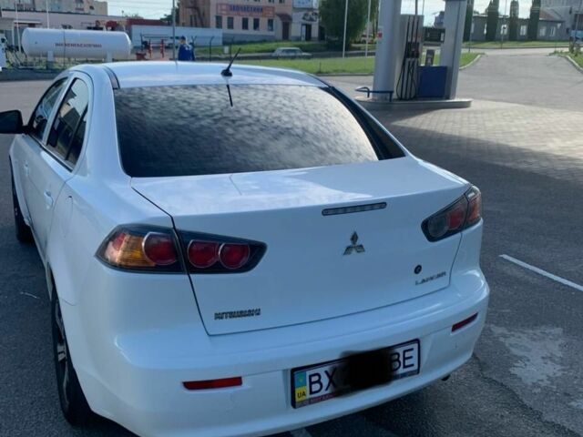 Мицубиси Лансер 2011 в Хмельницком на Automoto.ua Белый Мицубиси Лансер, объемом двигателя 1.5 л и пробегом 162 тыс. км за 6300 $, фото 4 на Automoto.ua