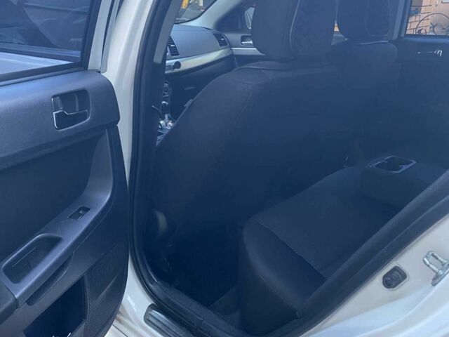 Білий Міцубісі Lancer, об'ємом двигуна 1.5 л та пробігом 218 тис. км за 6000 $, фото 6 на Automoto.ua