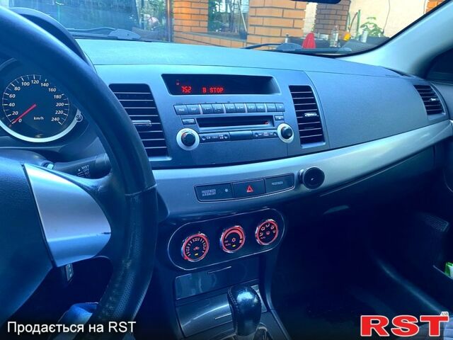 Білий Міцубісі Lancer, об'ємом двигуна 1.5 л та пробігом 218 тис. км за 6000 $, фото 2 на Automoto.ua