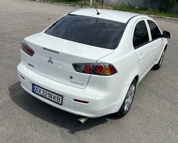 Білий Міцубісі Lancer, об'ємом двигуна 1.5 л та пробігом 190 тис. км за 5700 $, фото 7 на Automoto.ua