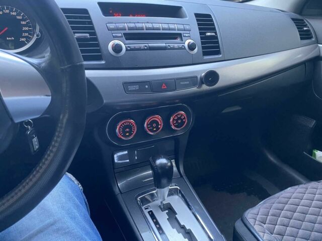 Білий Міцубісі Lancer, об'ємом двигуна 1.5 л та пробігом 218 тис. км за 6000 $, фото 3 на Automoto.ua