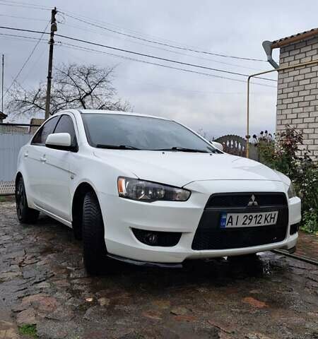 Белый Мицубиси Лансер, объемом двигателя 1.5 л и пробегом 160 тыс. км за 7600 $, фото 10 на Automoto.ua