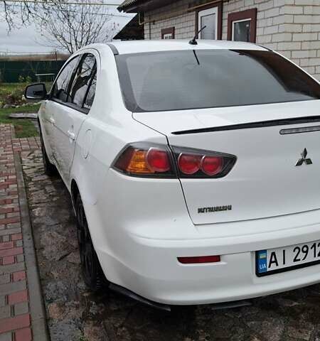 Белый Мицубиси Лансер, объемом двигателя 1.5 л и пробегом 160 тыс. км за 7600 $, фото 4 на Automoto.ua